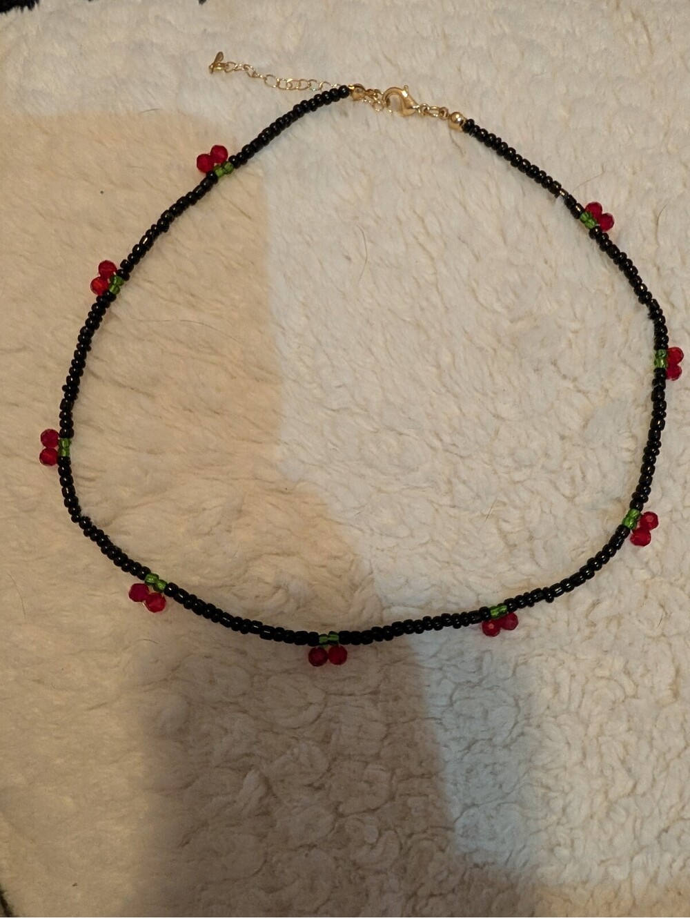 Handmade Black Beaded Necklace with Red and Green Cherry Accents